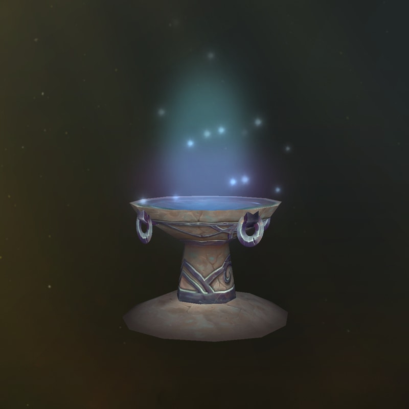 una pequeña masa de agua brillante sobre una fuente de piedra