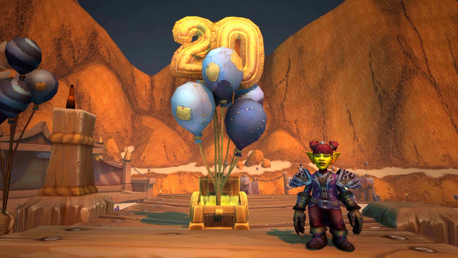 Unos globos saliendo de una arqueta pequeña. Dos de ellos forman el número 20.