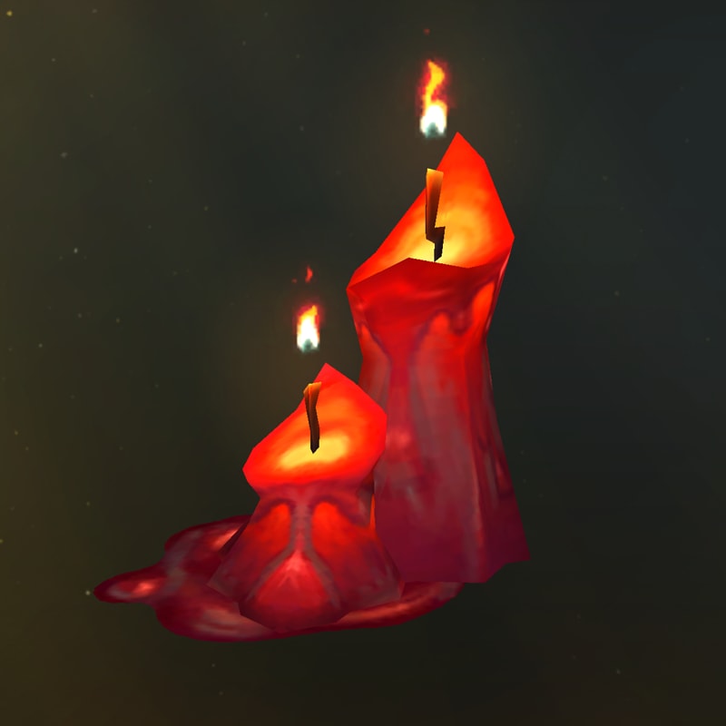 dos velas rojas derritiéndose con llamas titilantes